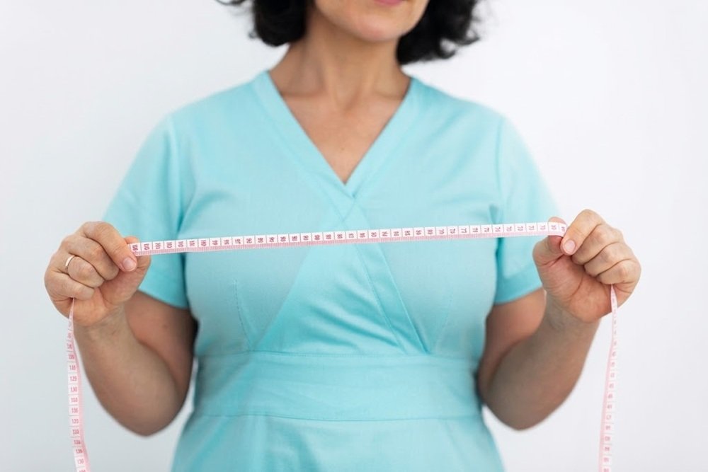Breast reduction surgery removes excess breast tissue