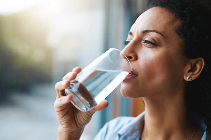 Drinking water to stay hydrated